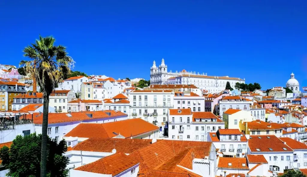 Lisbon Portugal cityscape with colorful houses and river view, one of the best cities to visit and top travel bucket list destination