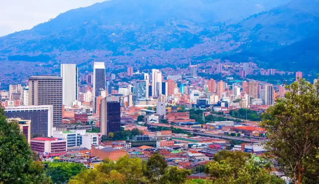 Medellin Colombia skyline surrounded by mountains, best place to travel and one of the best cities to visit in South America